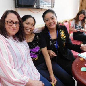 Group of women sitting on couch