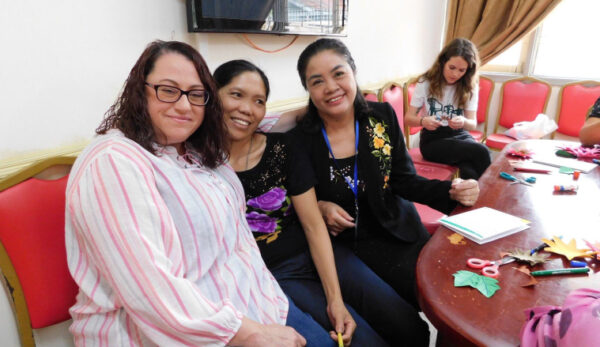 Group of women sitting on couch