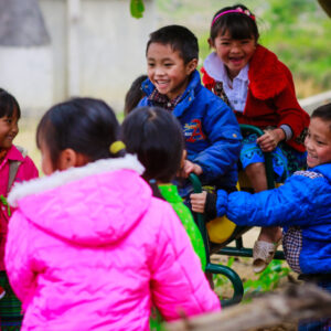 Children playing in winter coats